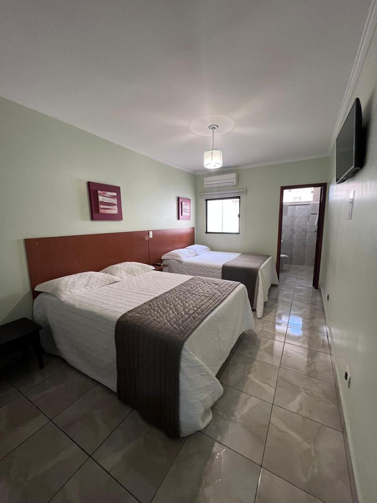 Quarto Duplo
